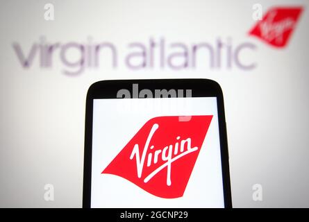 Ukraine. 9 août 2021. Dans cette illustration, un logo Virgin Atlantic est visible sur un smartphone et un écran de pc. (Credit image: © Pavlo Gonchar/SOPA Images via ZUMA Press Wire) Banque D'Images