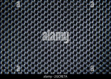 Gros plan sur la texture textile en fibre de carbone. Fond en tissu très résistant Banque D'Images