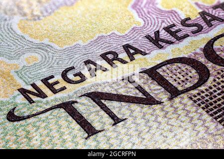 Photographie macro d'un billet Rupiah 5000. Gros plan sur l'argent indonésien. Billet de banque de l'Indonésie. L'argent de l'Indonésie a une très faible valeur et Banque D'Images