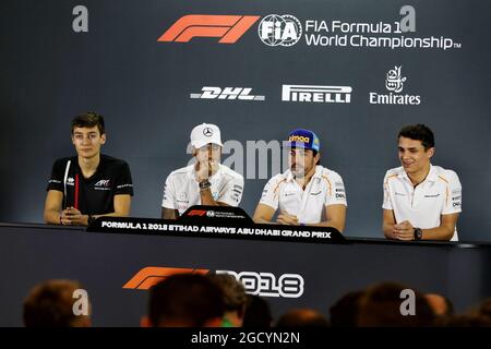 Conférence de presse de la FIA (de gauche à droite) : George Russell (GBR) pilote d'Art Grand Prix F2 / pilote de réserve Mercedes AMG F1 / Williams ; Lewis Hamilton (GBR) Mercedes AMG F1 ; Fernando Alonso (ESP) McLaren ; pilote d'essai Lando Norris (GBR) McLaren. Grand Prix d'Abu Dhabi, jeudi 22 novembre 2018. Yas Marina circuit, Abu Dhabi, Émirats Arabes Unis. Banque D'Images