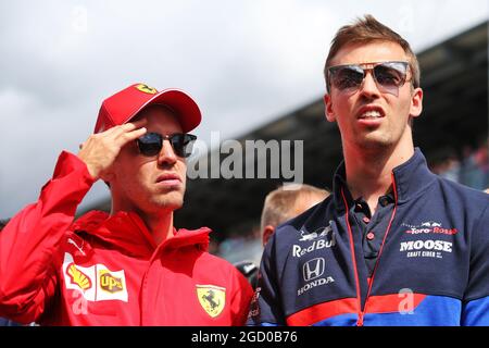 (De gauche à droite): Sebastian Vettel (GER) Ferrari et Daniil Kvyat (RUS) Scuderia Toro Rosso sur le défilé des pilotes. Grand Prix d'Italie, dimanche 8 septembre 2019. Monza Italie. Banque D'Images