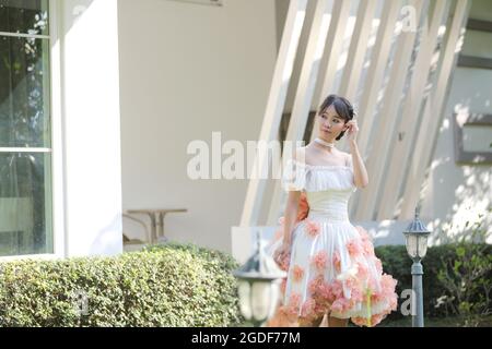 Robe blanche de mariée asiatique Banque D'Images