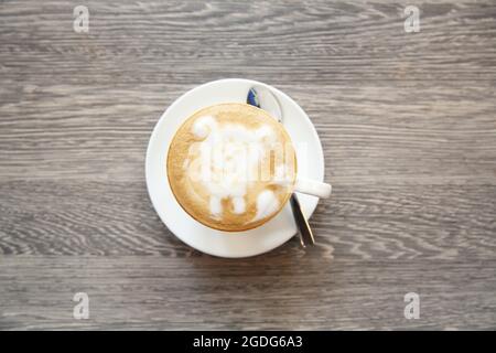 Café sur fond de bois Banque D'Images