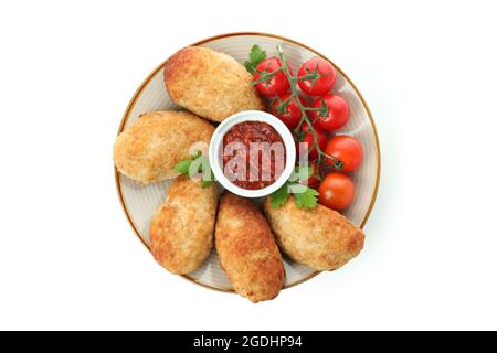 Assiette avec des Preutlets, des tomates et de la sauce isolée sur fond blanc Banque D'Images