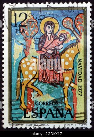 ESPAGNE - VERS 1977: Un timbre imprimé en Espagne montre vol en Égypte, dessin de peinture romane au Musée Jaca Catheral, vers 1977 Banque D'Images