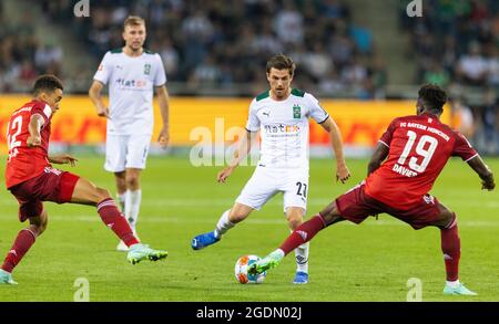 Jonas Hofmann (BMG), Jamal Musiala (Muenchen), Alphonso Davies (Muenchen) Borussia Mönchengladbach - FC Bayern München 13.08.2021, Fussball; 1. Bundes Banque D'Images