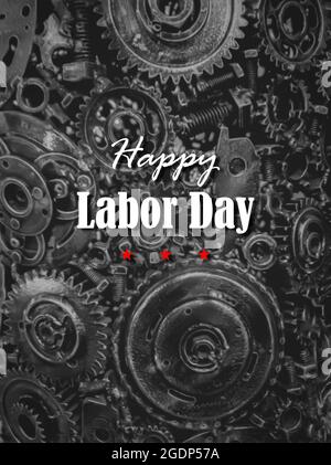 Carte de la fête du travail. Création de bannière avec inscription Happy Labor Day sur un fond technologique, moderne, mécanisme avec différents types de métal g Banque D'Images