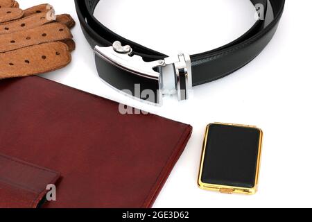 Un ensemble d'homme.Accessoires pour hommes.Portefeuille, gants, ceinture Banque D'Images