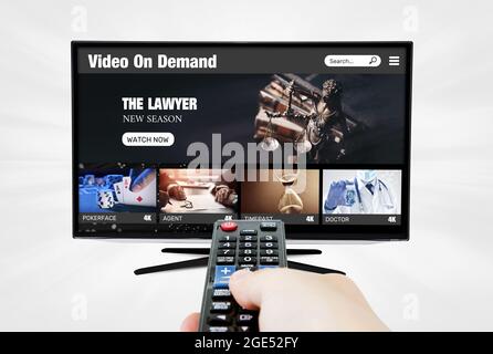 Vidéo à la demande, diffusion TV, multimédia. Télécommande manuelle Banque D'Images