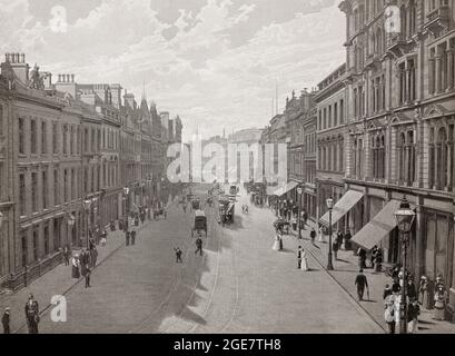 Vue de la fin du XIXe siècle sur Donegal place, au centre-ville de Belfast, la capitale et la plus grande ville d'Irlande du Nord, sur les rives de la rivière Lagan sur la côte est. Belfast a été un port important jouant un rôle important dans la révolution industrielle en Irlande, lui gagnant le surnom de "Linenopolis" comme un centre majeur de la production de lin irlandais, de la transformation du tabac et de la fabrication de corde. La construction navale était également une industrie clé; le chantier naval Harland et Wolff, qui a construit le RMS Titanic, était le plus grand chantier naval du monde. Banque D'Images