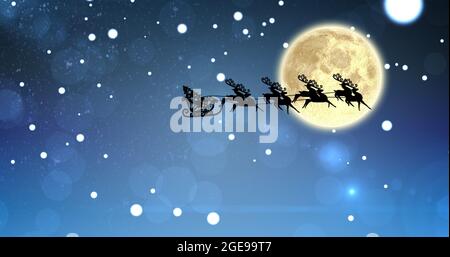 Composition du père noël en traîneau avec renne sur étoiles et lune Banque D'Images