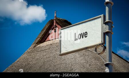 Plaque de Rue le sens moyen de l'amour Banque D'Images