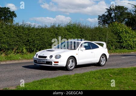 Une vue avant des années 1990 Toyota Celica Gt-4 coupé blanc vintage classique voiture rétro voiture conducteur automobile Banque D'Images