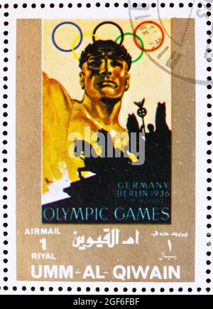 UMM AL-QUWAIN - VERS 1972: Un timbre imprimé dans l'Umm al-Quwain montre Berlin 1936, Allemagne, Jeux Olympiques du passé, vers 1972 Banque D'Images