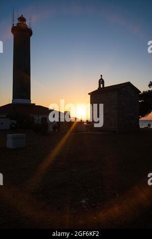 Coucher de soleil sur le phare de Veli Rat sur l'île de Dugi Otok, Croatie Banque D'Images