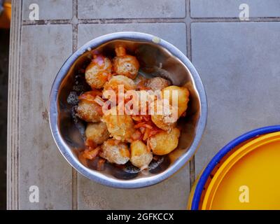 Punugulu, un snack populaire d'Andhra, Visakhapatnam, AP, Inde Banque D'Images