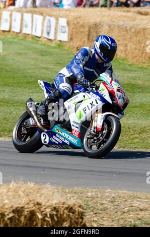 La moto FIXI Crescent Suzuki GSX-R1000 monte sur la piste de montée de la colline à l'événement 2014 du Festival de vitesse de Goodwood Banque D'Images