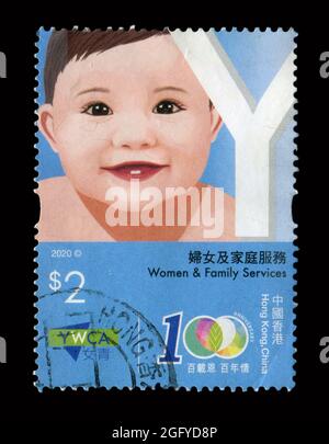Le timbre imprimé à HONG KONG, en Chine, montre l'image de Women & Family Services, vers 2020. Banque D'Images
