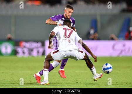 Stade Artemio Frachi, Florence, Italie, 28 août 2021, Cristiano Biraghi (Fiorentina) et Wilfried Singo (Torino) pendant l'ACF Fiorentina vs Torino Banque D'Images