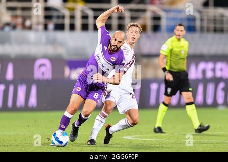 Stade Artemio Frachi, Florence, Italie, 28 août 2021, Riccardo Saponara (Fiorentina) et Mergim Vojvoda (Torino) pendant l'ACF Fiorentina vs Torino Banque D'Images