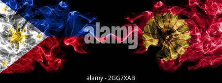 Philippines, philippin vs Japon, japonais, drapeau de fumée empereur côte à côte. Banque D'Images