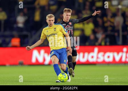 Brondby, Danemark. 29 août 2021. Tobias Borkeeiet (42) de Broendby IF et Charles (35) du FC Midtjylland vus pendant le match 3F Superliga entre Broendby IF et FC Midtjylland à Brondby Stadion. (Crédit photo : Gonzales photo/Alamy Live News Banque D'Images