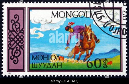 MONGOLIE - VERS 1987 : un timbre imprimé en Mongolie montre Retriing Flags, sports équestres traditionnels, vers 1987 Banque D'Images