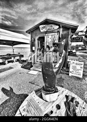 Perry's Lobster Shack est une cabane au bord de l'eau offrant des assiettes de homard et de fruits de mer ainsi que des accompagnements et des bières copieux. Banque D'Images