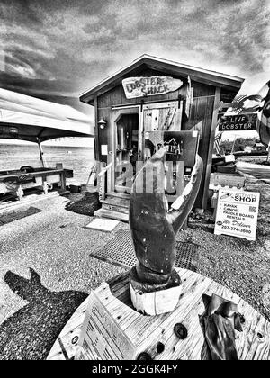 Perry's Lobster Shack est une cabane au bord de l'eau offrant des assiettes de homard et de fruits de mer ainsi que des accompagnements et des bières copieux. Banque D'Images