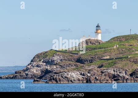 Phare de Fidra et île vue de la plage de Yellowcriag, Lothian est. Banque D'Images