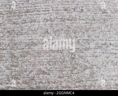 Mur de ciment rustique gris clair texturé. Toile de fond concrète. Banque D'Images
