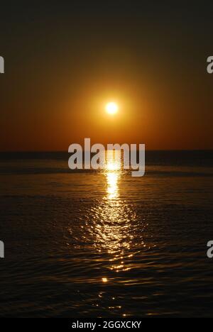 Coucher de soleil sur Heacham Beach, Norfolk Banque D'Images