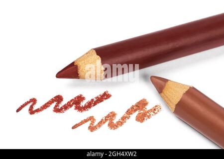 Revêtements de lèvres et traits isolés sur blanc Banque D'Images