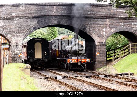 Great Eastern Railway 0-6-0 no 564 départ de la gare de Weybourne avec un train jusqu'à l'arrêt Banque D'Images