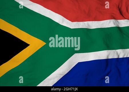 Gros plan plein format sur un drapeau sud-africain en rendu 3D. Banque D'Images