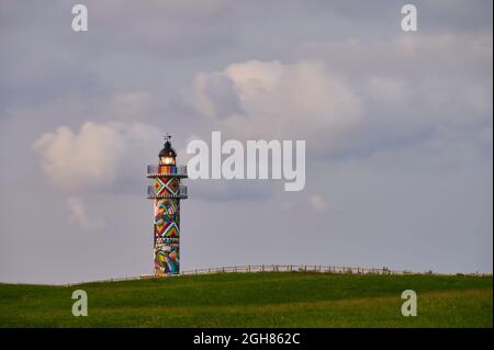 Phare de Cabo de Ajo peint par le peintre Okuda San Miguel, spécialisé en Art urbain Ajo, Municipalité de Bareyo, Cantabrie, Mer de Cantabrique, Espagne, Banque D'Images