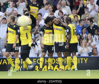 Troy Deeney de Watford célèbre son sixième but lors du match du championnat Sky Bet entre Watford et AFC Bournemouth qui s'est tenu à Vicarage Road à Watford, au Royaume-Uni, le 10 août 2013. Photo de: David Klein Banque D'Images