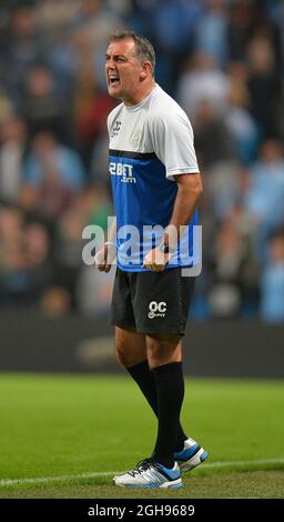 Owen Coyle directeur de Wigan Athletic lors de la coupe Capital One, troisième tour de match entre Manchester City et Wigan Athletic au stade Etihad à Manchester le 24 septembre 2013. Banque D'Images