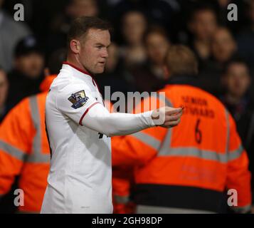 Wayne Rooney, de Manchester United, a lancé une pièce de monnaie sur lui lors du match de la Barclays Premier League entre Crystal Palace et Manchester United à Selhurst Park, Londres, Royaume-Uni, le 22 février 2014. Banque D'Images