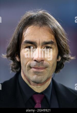 Robert pires, ancien joueur d'Arsenal, est présent lors de la Ligue des champions de l'UEFA, lors du match de la série 16 entre le Bayern Munich et l'Arsenal à l'Allianz Arena de Munich, en Allemagne, le 11 mars 2014. Photo David Klein. Banque D'Images