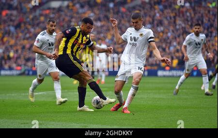 Troy Deeney de Watford est défié par Conor Coady de Wolverhampton Wanderes lors du match semi final de la coupe FA, au stade Wembley, Londres. Date de la photo : 7 avril 2019. Le crédit photo doit être lu : Robin Parker/Sportimage via PA Images Banque D'Images