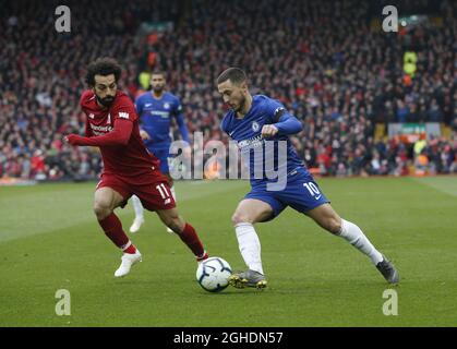 Eden Hazard of Chelsea dévie de Mohamed Salah de Liverpool lors du match de la Premier League à Anfield, Liverpool. Date de la photo : 14 avril 2019. Le crédit photo doit se lire comme suit : Andrew Yates/Sportimage via PA Images Banque D'Images