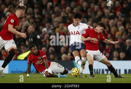 Le fils Heung-min (C) de Tottenham Hotspur est défié par Daniel James (R) de Manchester United et Fred de Manchester United lors du match de la Premier League à Old Trafford, Manchester. Date de la photo : 4 décembre 2019. Le crédit photo doit être lu : Darren Staples/Sportimage via PA Images Banque D'Images