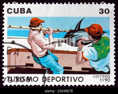 CUBA - VERS 1990 : un timbre imprimé à Cuba montre la pêche en haute mer, le tourisme, vers 1990 Banque D'Images