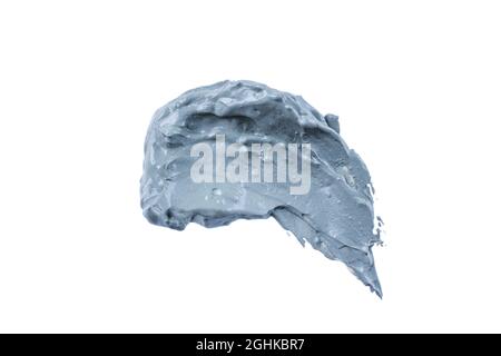 Frottis d'argile cosmétique bleu humide isolé sur fond blanc. Échantillon abstrait d'argile cosmétique bleue. Masque de beauté facial pour la peau Detox. Banque D'Images