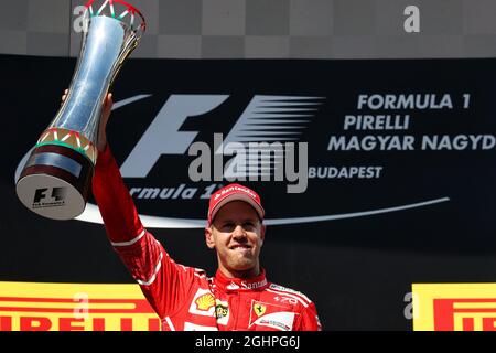 Le vainqueur de la course Sebastian Vettel (GER) Ferrari fête sur le podium. 30.07.2017. Championnat du monde de Formule 1, Rd 11, Grand Prix de Hongrie, Budapest, Hongrie, Jour de la course. Le crédit photo doit être lu : images XPB/Press Association. Banque D'Images