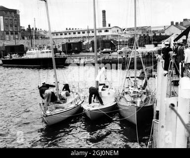 Plymouth ; trois des yachts sont entrés pour la course de 3 miles à New York , vu amarré à Millbay Docks , Plymouth , juste avant leur départ . De gauche à droite ; '' Eira '' , '' Jester '' , et '' Cardinal Vertue '' . 11 juin 1960 Banque D'Images
