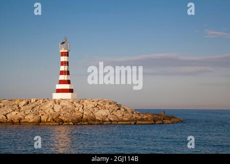 Phare au coucher du soleil à la Romana Casa de Campo Marina à Punta Cana, République Dominicaine. Banque D'Images