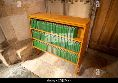 Une bibliothèque de livres d'hymnes dans la cathédrale de norwich Banque D'Images