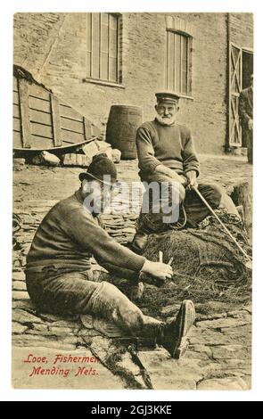 Carte postale photographique originale du début des années 1900 les pêcheurs de Looe qui se sont mis à la mer le 7 octobre 1912, Cornwall Banque D'Images